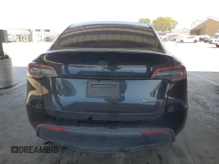 2024 Tesla Model Y Long Range с VIN 7SAYGDEE8RF983280, выставлен на аукционе Copart как лот 55417555 с пробегом 52 273 миль миль и Списание • Salvage title. История ставок и продаж доступна на DreamBid. Изображение 6.