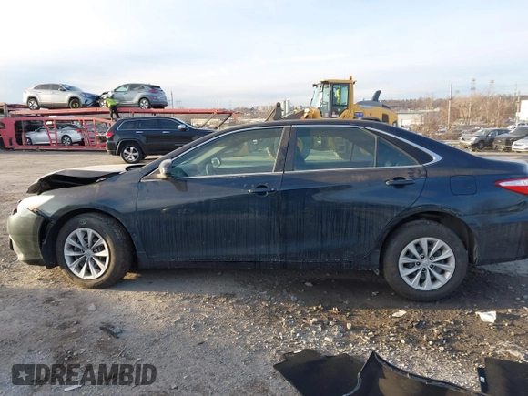 2016 Toyota Camry XLE with VIN 4T1BF1FK1GU509261, listed as a IAAI auction lot 41296127 with 159,300 mi miles and . Bid and sale history available at DreamBid. Image 13.