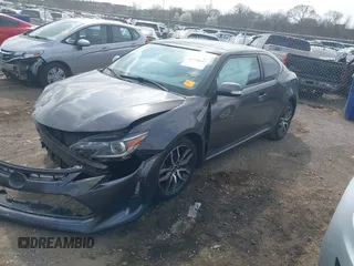 2015 Scion tC z VIN JTKJF5C70FJ013710, wystawiony jako IAAI lot #41770647 z przebiegiem Nie podano mil oraz . Historia ofert i sprzedaży dostępna na DreamBid. Obrazek 17.