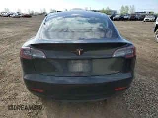 2019 Tesla Model 3 Mid Range z VIN 5YJ3E1EA7KF420025, wystawiony jako Copart lot #56149015 z przebiegiem 253 771 mil mil oraz Szkoda całkowita • Salvage title. Historia ofert i sprzedaży dostępna na DreamBid. Obrazek 6.