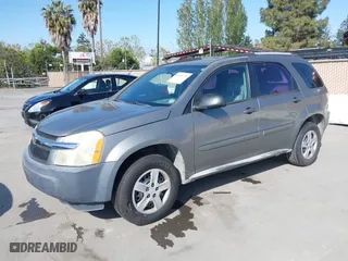 2005 Chevrolet Equinox LS with VIN 2CNDL13F656160747, listed as a IAAI auction lot 42054793 with 156,479 mi miles. Bid and sale history available at carsss.com. Image 2.