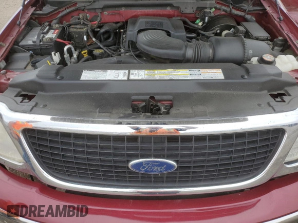 1999 Ford Expedition XLT with VIN 1FMPU18L6XLA61106, listed as a Copart auction lot 62688735 with 105,551 mi miles and Salvage title. Bid and sale history available at DreamBid. Image 12.
