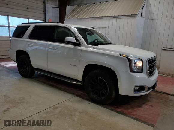 2015 GMC Yukon SLE with VIN 1GKS2AKC6FR254238, listed as a Copart auction lot 51863535 with 110,898 mi miles and Salvage Title. Bid and sale history available at carsss.com. Image 4.