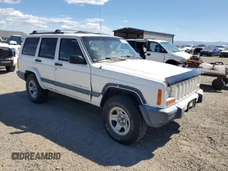 2000 Jeep Cherokee with VIN 1J4FF48S6YL169224, listed as a Copart auction lot 64411145 with 237,553 mi miles and Clean title. Bid and sale history available at DreamBid. Image 4.