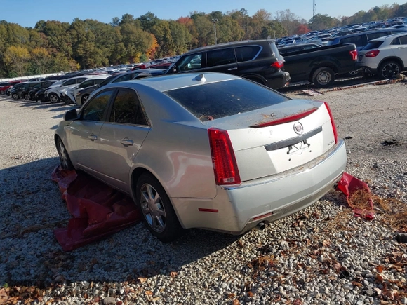 2009 Cadillac CTS AWD w/1SA with VIN 1G6DG577990113457, listed as a IAAI auction lot 38002705 with 101,298 mi miles. Bid and sale history available at carsss.com. Image 3.