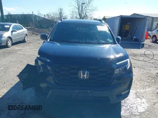 2023 Honda Passport Elite with VIN 5FNYF8H04PB006514, listed as a IAAI auction lot 41537826 with 14,640 mi miles and . Bid and sale history available at DreamBid. Image 13.