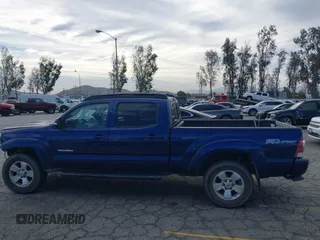 2015 Toyota Tacoma with VIN 3TMMU4FN0FM077148, listed as a IAAI auction lot 41274934 with 112,617 mi miles and . Bid and sale history available at DreamBid. Image 15.