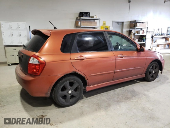 2007 Kia Spectra with VIN KNAFE161775008415, listed as a Copart auction lot 76591404 with 221,117 mi miles and Clean Title. Bid and sale history available at carsss.com. Image 3.