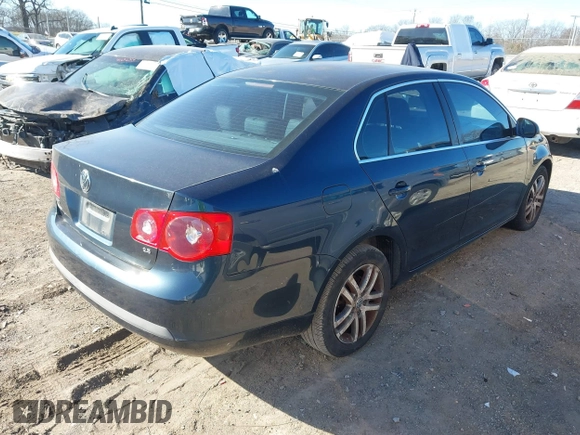 2006 Volkswagen Jetta 2.5L z VIN 3VWRF71K26M772095, wystawiony jako IAAI lot #41706041 z przebiegiem 187 007 mil mil oraz . Historia ofert i sprzedaży dostępna na DreamBid. Obrazek 4.