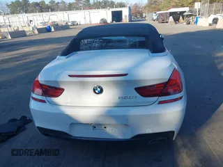 2012 BMW 6 Series 650i with VIN WBALZ3C51CDL73084, listed as a IAAI auction lot 41656473 with 61,152 mi miles and . Bid and sale history available at carsss.com. Image 16.