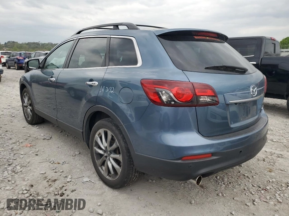 2015 Mazda CX-9 Grand Touring z VIN JM3TB2DAXF0448042, wystawiony jako Copart lot #53620085 z przebiegiem 134 386 mil mil oraz Szkoda całkowita • Salvage title. Historia ofert i sprzedaży dostępna na DreamBid. Obrazek 2.