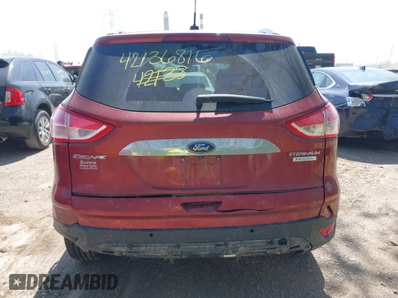 2015 Ford Escape Titanium with VIN 1FMCU0J92FUA38616, listed as a IAAI auction lot 42136816 with 131,941 mi miles and . Bid and sale history available at DreamBid. Image 16.