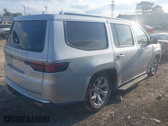 2022 Jeep Wagoneer Series III with VIN 1C4SJVDT1NS200825, listed as a IAAI auction lot 42143272 with 20,548 mi miles and . Bid and sale history available at DreamBid. Image 4.