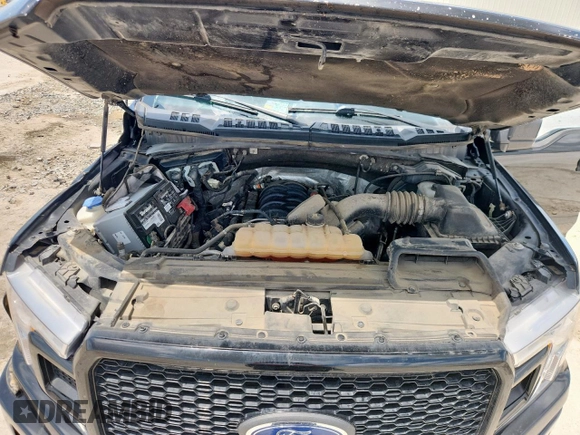 2018 Ford F-150 XL with VIN 1FTEW1E57JFC39493, listed as a Copart auction lot 61781395 with 129,871 mi miles and Salvage title. Bid and sale history available at DreamBid. Image 11.