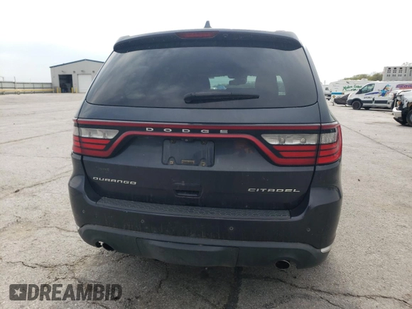 2014 Dodge Durango Citadel z VIN 1C4RDHEG4EC975557, wystawiony jako Copart lot #55117245 z przebiegiem 210 347 mil mil oraz Czysty tytuł • Clean title. Historia ofert i sprzedaży dostępna na DreamBid. Obrazek 6.
