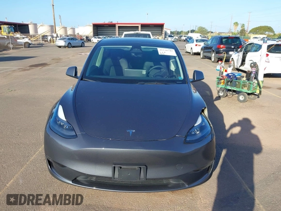 2023 Tesla Model Y Long Range with VIN 7SAYGDEE0PF928836, listed as a IAAI auction lot 41538742 with 9,630 mi miles and . Bid and sale history available at DreamBid. Image 12.