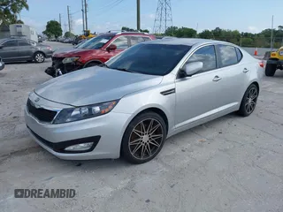 2013 Kia Optima LX with VIN KNAGM4A75D5380478, listed as a IAAI auction lot 42153829 with 82,845 mi miles. Bid and sale history available at carsss.com. Image 2.