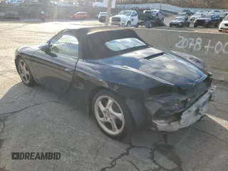 2000 Porsche Boxster z VIN WP0CA2980YU626358, wystawiony jako Copart lot #36977344 z przebiegiem 117 561 mil mil oraz Szkoda całkowita • Salvage title. Historia ofert i sprzedaży dostępna na DreamBid. Obrazek 2.