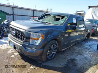 2021 Ford F-150 XL z VIN 1FTEW1C51MFC94173, wystawiony jako IAAI lot #41628222 z przebiegiem 23 266 mil mil oraz . Historia ofert i sprzedaży dostępna na DreamBid. Obrazek 18.