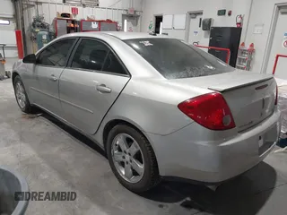 2005 Pontiac G6 GT with VIN 1G2ZH528854167162, listed as a IAAI auction lot 40973635 with 207,742 mi miles. Bid and sale history available at carsss.com. Image 3.
