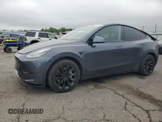 2021 Tesla Model Y Long Range z VIN 5YJYGDEE4MF080260, wystawiony jako Copart lot #55785345 z przebiegiem 82 852 mil mil oraz Szkoda całkowita • Salvage title. Historia ofert i sprzedaży dostępna na DreamBid. Obrazek 1.