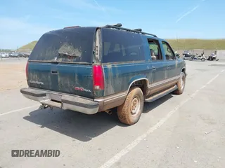 1997 GMC Suburban z VIN 1GKFK16R5VJ748880, wystawiony jako IAAI lot #41975824 z przebiegiem 302 899 mil mil oraz . Historia ofert i sprzedaży dostępna na DreamBid. Obrazek 4.