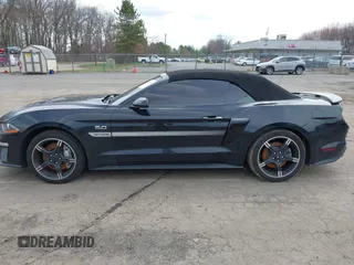 2021 Ford Mustang GT Premium with VIN 1FATP8FF4M5143096, listed as a IAAI auction lot 42013344 with 20,221 mi miles and . Bid and sale history available at DreamBid. Image 14.