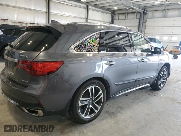 2017 Acura MDX Advance with VIN 5FRYD4H82HB001719, listed as a Copart auction lot 54055205 with 106,527 mi miles and Salvage title. Bid and sale history available at DreamBid. Image 3.