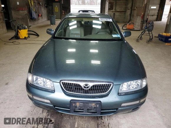 2000 Mazda Millenia z VIN JM1TA2212Y1610919, wystawiony jako Copart lot #80375014 z przebiegiem 127 938 mil mil oraz Szkoda całkowita • Salvage title. Historia ofert i sprzedaży dostępna na DreamBid. Obrazek 5.