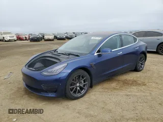 2018 Tesla Model 3 Long Range Battery z VIN 5YJ3E1EB7JF150964, wystawiony jako Copart lot #52561445 z przebiegiem 87 830 mil mil oraz Szkody całkowita. Historia ofert i sprzedaży dostępna na DreamBid. Obrazek 1.