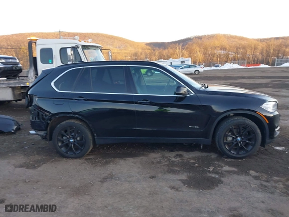 2016 BMW X5 xDrive35i with VIN 5UXKR0C50G0U11610, listed as a IAAI auction lot 41427499 with 75,330 mi miles. Bid and sale history available at carsss.com. Image 13.