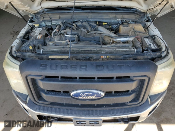 2011 Ford F-250 XL with VIN 1FT7W2AT8BEC35849, listed as a Copart auction lot 52497815 with 210,924 mi miles and Salvage title. Bid and sale history available at DreamBid. Image 11.