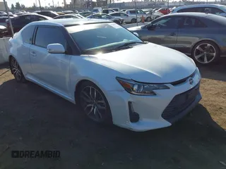 2016 Scion tC z VIN JTKJF5C7XGJ016843, wystawiony jako IAAI lot #41548056 z przebiegiem 143 753 mil mil oraz . Historia ofert i sprzedaży dostępna na DreamBid. Obrazek 1.