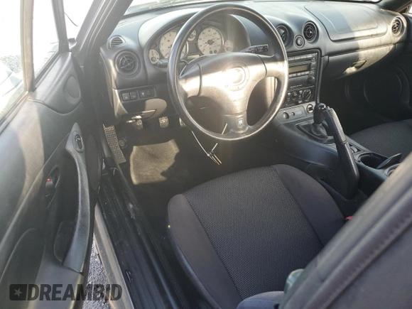 2002 Mazda MX-5 Miata Cloth with VIN JM1NB353420220801, listed as a Copart auction lot 61808645 with 116,451 mi miles and Salvage title. Bid and sale history available at DreamBid. Image 8.