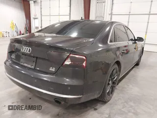 2011 Audi A8 with VIN WAURVAFD1BN016929, listed as a IAAI auction lot 42144918 with 171,874 mi miles and . Bid and sale history available at DreamBid. Image 4.