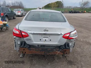 2016 Nissan Altima S z VIN 1N4AL3APXGN331521, wystawiony jako IAAI lot #42044462 z przebiegiem 119 130 mil mil oraz . Historia ofert i sprzedaży dostępna na DreamBid. Obrazek 16.