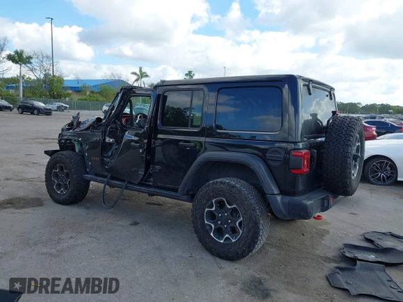 2023 Jeep Wrangler Rubicon with VIN 1C4HJXFGXPW534515, listed as a IAAI auction lot 41524419 with 21,376 mi miles and . Bid and sale history available at DreamBid. Image 3.
