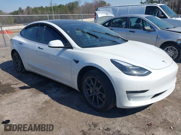 2023 Tesla Model 3 Long Range with VIN 5YJ3E1EB1PF393565, listed as a IAAI auction lot 41656060 with 16,236 mi miles and . Bid and sale history available at DreamBid. Image 1.