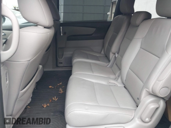 2016 Honda Odyssey EX-L with VIN 5FNRL5H61GB147766, listed as a IAAI auction lot 41822141 with 105,261 mi miles and . Bid and sale history available at DreamBid. Image 8.