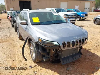2019 Jeep Cherokee Latitude with VIN 1C4PJLCX7KD220799, listed as a IAAI auction lot 41970875 with 104,394 mi miles and . Bid and sale history available at DreamBid. Image 1.