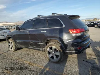 2014 Jeep Grand Cherokee Overland with VIN 1C4RJFCT4EC506790, listed as a Copart auction lot 47827675 with 163,511 mi miles and Salvage Title. Bid and sale history available at DreamBid. Image 2.