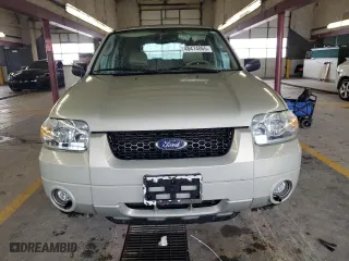 2005 Ford Escape Limited with VIN 1FMCU94115KD64704, listed as a Copart auction lot 48474865 with 123,739 mi miles and Salvage Title. Bid and sale history available at carsss.com. Image 5.
