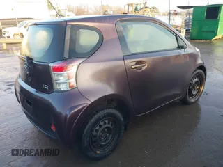 2013 Scion iQ with VIN JTNJJXB07DJ022337, listed as a IAAI auction lot 41507619 with Not provided miles and . Bid and sale history available at DreamBid. Image 4.