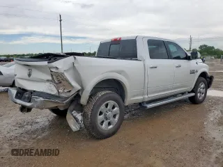 2016 Ram 2500 Laramie with VIN 3C6UR5FL2GG125021, listed as a Copart auction lot 58519995 with 123,055 mi miles and Salvage title. Bid and sale history available at DreamBid. Image 3.
