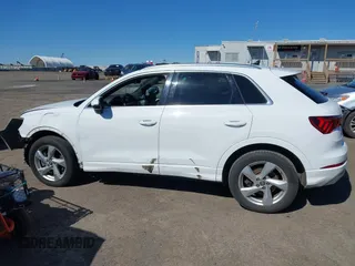2019 Audi Q3 Premium with VIN WA1AECF37K1077089, listed as a IAAI auction lot 41742732 with 61,038 mi miles and . Bid and sale history available at DreamBid. Image 14.