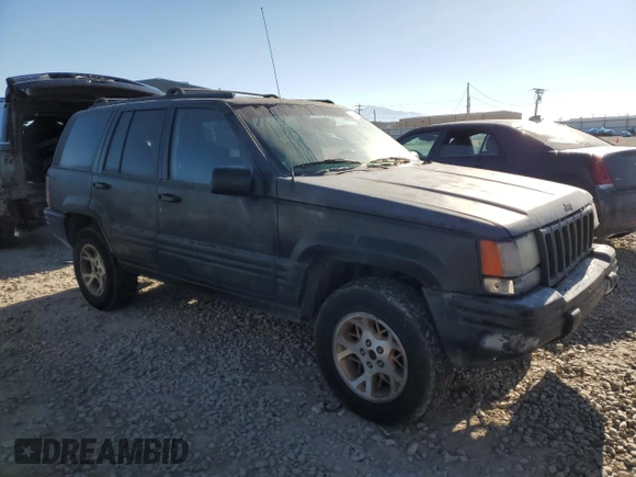 1997 Jeep Grand Cherokee Limited with VIN 1J4GZ78Y1VC563890, listed as a Copart auction lot 41910925 with 0 mi miles and Clean Title. Bid and sale history available at carsss.com. Image 4.