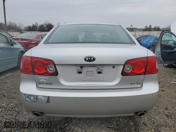 2007 Kia Optima EX with VIN KNAGE124X75120601, listed as a Copart auction lot 83358924 with 168,546 mi miles and Clean Title. Bid and sale history available at carsss.com. Image 6.