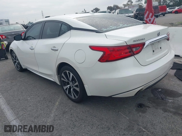 2016 Nissan Maxima SL with VIN 1N4AA6AP3GC448957, listed as a IAAI auction lot 41734717 with 128,687 mi miles and . Bid and sale history available at DreamBid. Image 3.