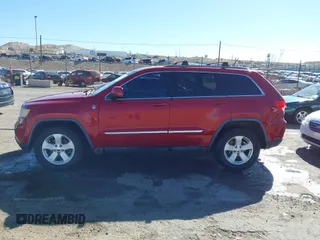 2011 Jeep Grand Cherokee 70th Anniversary with VIN 1J4RR4GT2BC703163, listed as a IAAI auction lot 41763149 with 184,523 mi miles. Bid and sale history available at carsss.com. Image 14.