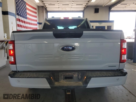 2023 Ford F-150 XL with VIN 1FTEW1EP9PKF55852, listed as a Copart auction lot 58379025 with 46,939 mi miles and Salvage title. Bid and sale history available at DreamBid. Image 6.